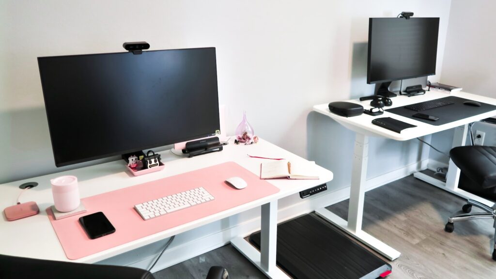 Standing desk setup in a small home office