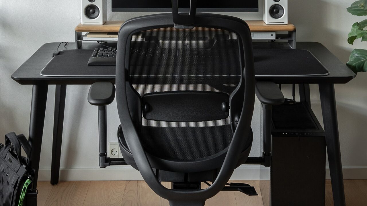 Ergonomic chair and desk setup for footrest and chair adjustment