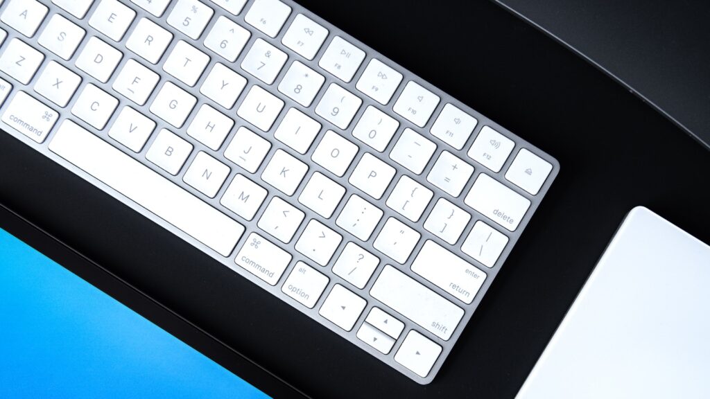 Minimal desktop with keyboard and accessories for cable tray planning